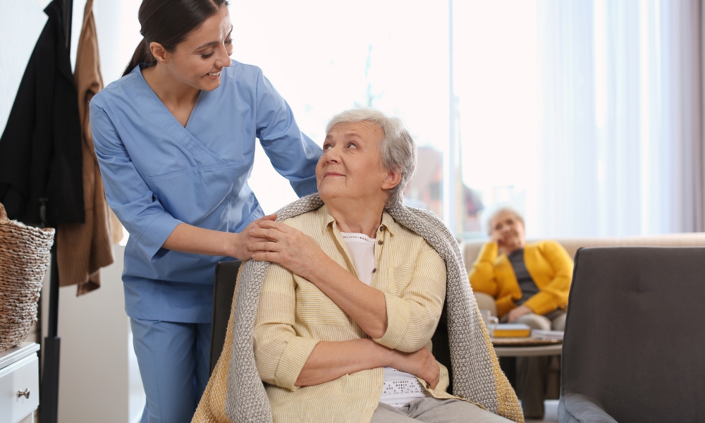 COPD patient practicing breathing exercises with home health support