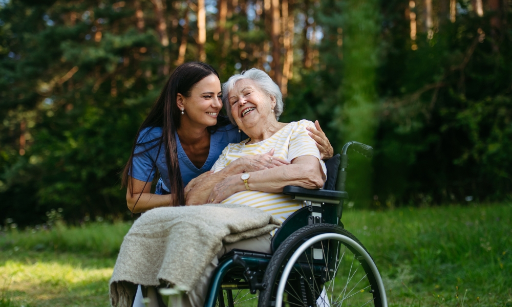 Companion caregiver assisting senior with daily activities at home