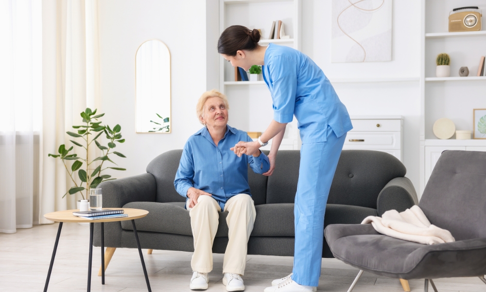 Skilled home health nurse providing medical care to patient at home
