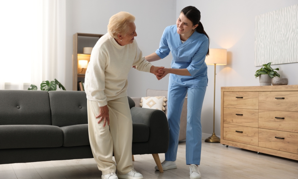 Physical therapist helping patient recover through home health care services
